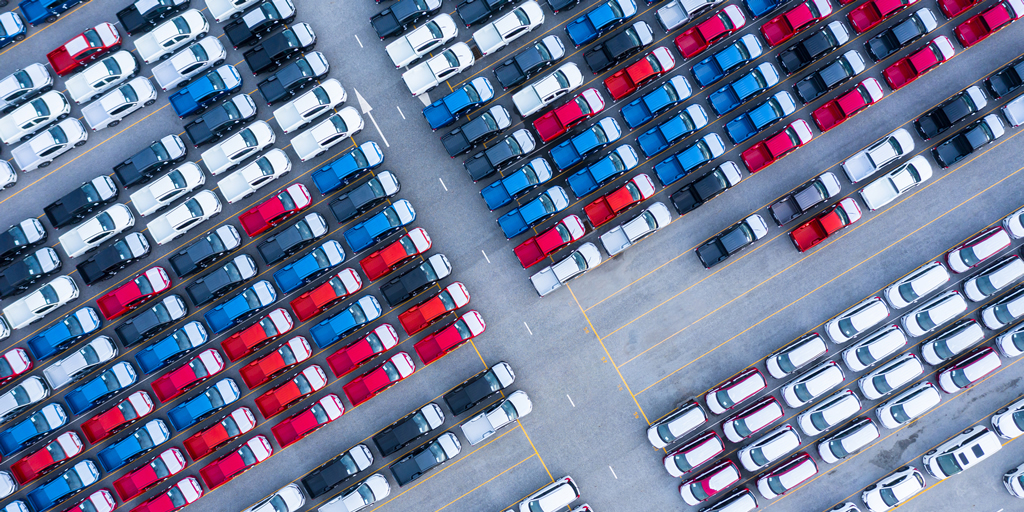 Image: Aerial view new cars for sale stock lot row Credit:AvigatorPhotographer istockphoto 1188533358